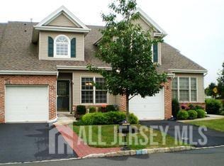 1 Silcox Pl, Franklin, NJ 08873 - view of front of house featuring brick siding and driveway