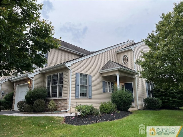 1 Silcox Pl, Franklin, NJ 08873 - view of home's exterior featuring a garage and a yard