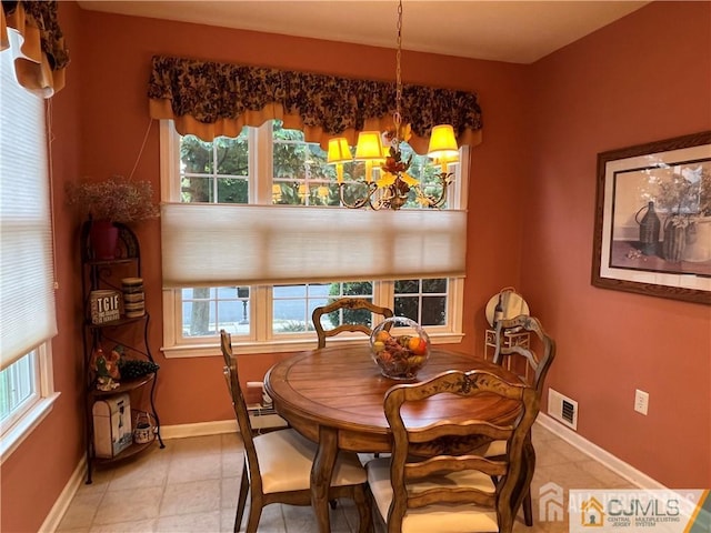 1 Silcox Pl, Franklin, NJ 08873 - dining space featuring plenty of natural light and a chandelier