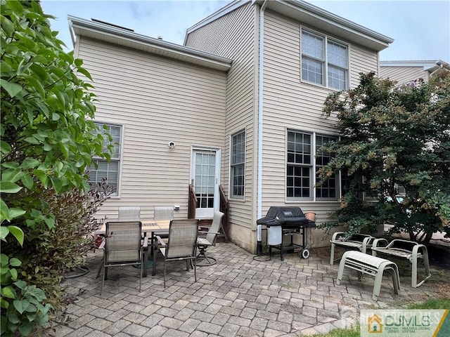 1 Silcox Pl, Franklin, NJ 08873 - view of patio featuring grilling area and entry steps