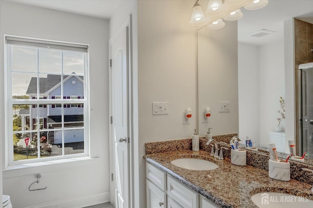 58 Begonia Ln, Monroe, NJ 08831 - bathroom with healthy amount of natural light, double vanity, and a shower with shower door