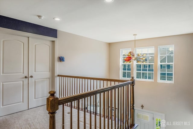 58 Begonia Ln, Monroe, NJ 08831 - stairs featuring healthy amount of natural light, recessed lighting, carpet floors, and a chandelier