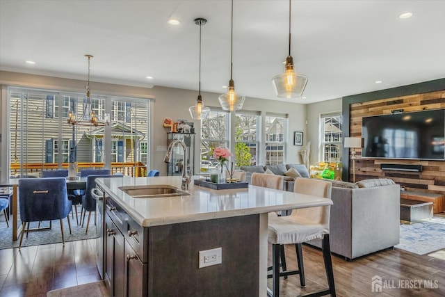 58 Begonia Ln, Monroe, NJ 08831 - kitchen with a sink, dark wood-style flooring, recessed lighting, dark brown cabinetry, and hanging light fixtures