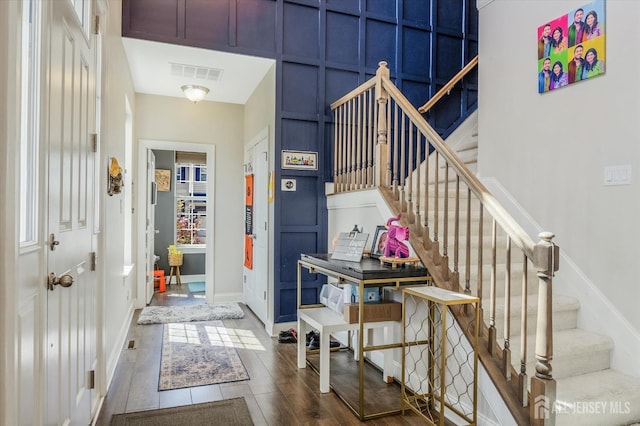 58 Begonia Ln, Monroe, NJ 08831 - entrance foyer featuring stairs, wood finished floors, and a decorative wall