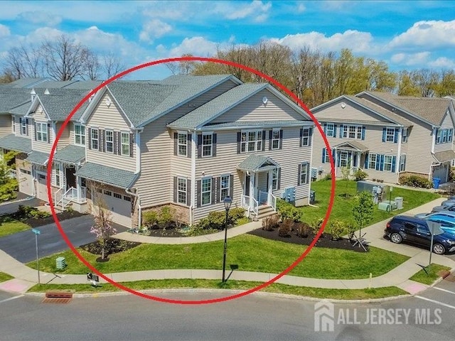 58 Begonia Ln, Monroe, NJ 08831 - multi unit property with a garage, driveway, a residential view, and a front yard