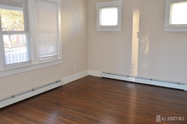 179 Decker Pl, Woodbridge Proper, NJ 07095 - spare room with a baseboard radiator, healthy amount of natural light, and wood finished floors