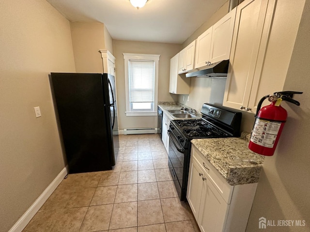 kitchen with white cabinets, a baseboard radiator, under cabinet range hood, black appliances, and a sink