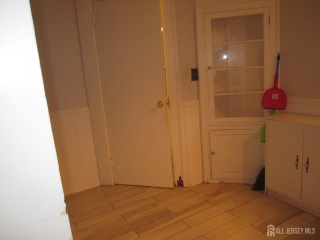 458 S Barclay St, Perth Amboy, NJ 08861 - hall with light wood finished floors and wainscoting