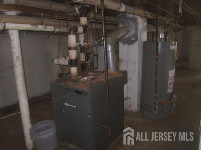 458 S Barclay St, Perth Amboy, NJ 08861 - utilities featuring water heater and a heating unit