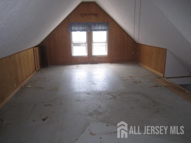 458 S Barclay St, Perth Amboy, NJ 08861 - additional living space with wooden walls and vaulted ceiling