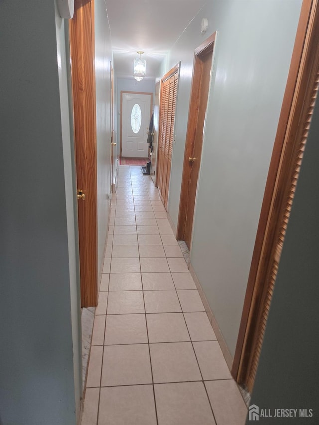 533 W Side Ave W, Perth Amboy, NJ 08861 - hallway with light tile patterned floors
