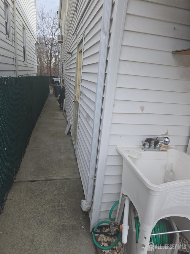 533 W Side Ave W, Perth Amboy, NJ 08861 - view of property exterior featuring fence
