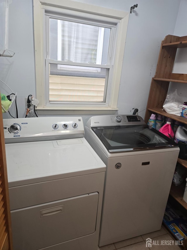 533 W Side Ave W, Perth Amboy, NJ 08861 - washroom featuring washer and dryer and tile patterned flooring