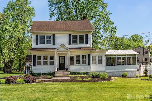 229 Greenbrook Rd, Green Brook, NJ 08812 - view of front of house featuring a chimney, a front yard, and a sunroom