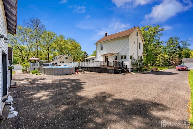 229 Greenbrook Rd, Green Brook, NJ 08812 - back of house with a deck and a chimney