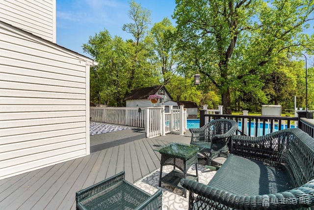 229 Greenbrook Rd, Green Brook, NJ 08812 - wooden deck featuring an outdoor pool, a storage shed, and view of scattered trees