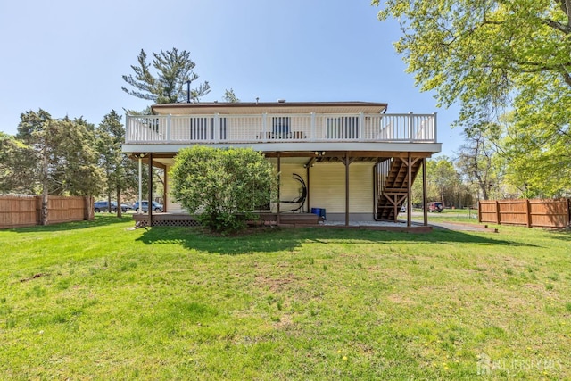 59 Normandy Dr, Piscataway, NJ 08854 - rear view of house featuring a wooden deck, stairs, and a patio