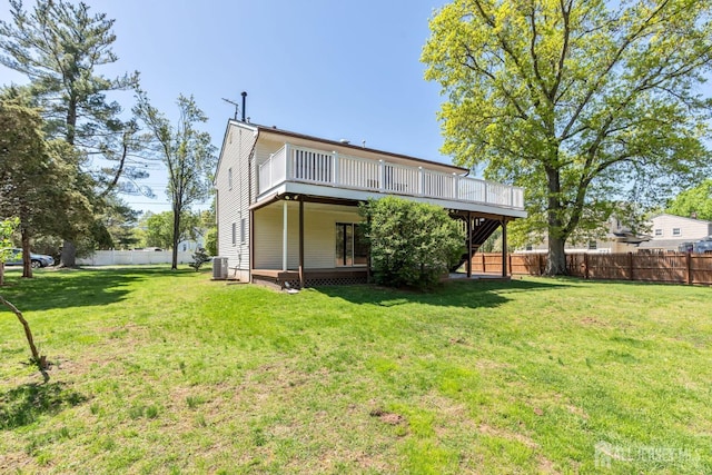 59 Normandy Dr, Piscataway, NJ 08854 - rear view of house featuring a deck, a fenced backyard, and stairs
