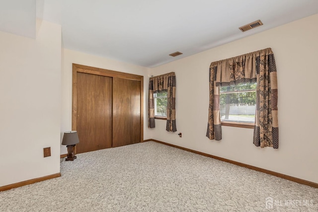 59 Normandy Dr, Piscataway, NJ 08854 - unfurnished bedroom featuring carpet floors and a closet