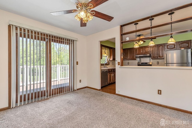 59 Normandy Dr, Piscataway, NJ 08854 - kitchen with appliances with stainless steel finishes, under cabinet range hood, carpet, a ceiling fan, and dark brown cabinets