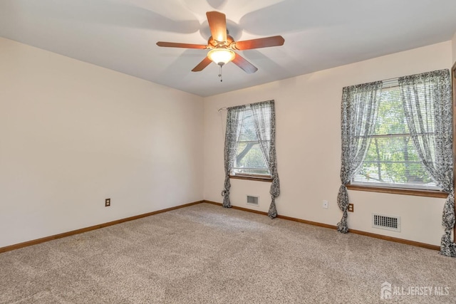 59 Normandy Dr, Piscataway, NJ 08854 - unfurnished room with plenty of natural light, light colored carpet, and ceiling fan