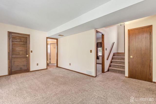 59 Normandy Dr, Piscataway, NJ 08854 - unfurnished room with carpet floors and stairs