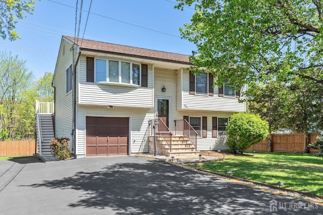 59 Normandy Dr, Piscataway, NJ 08854 - split foyer home featuring driveway and an attached garage