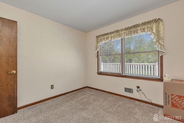 59 Normandy Dr, Piscataway, NJ 08854 - carpeted empty room featuring baseboards