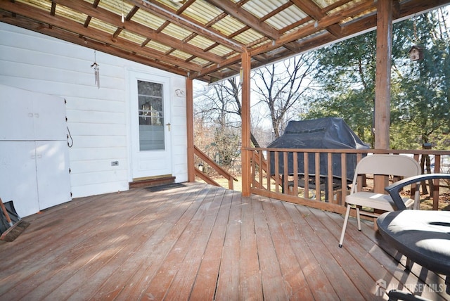 deck featuring a grill