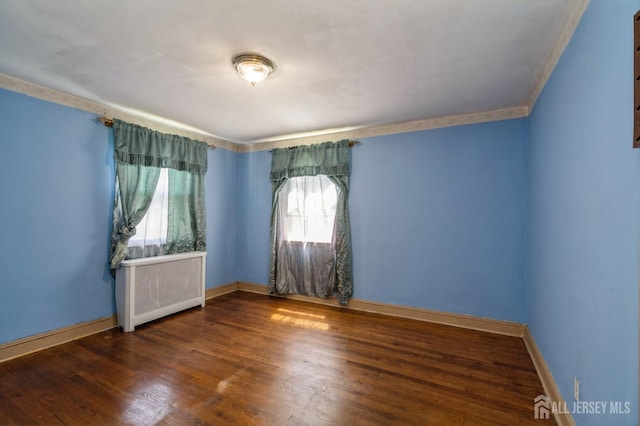 571 Greenbrook Rd, North Plainfield, NJ 07063 - spare room with radiator heating unit and wood finished floors