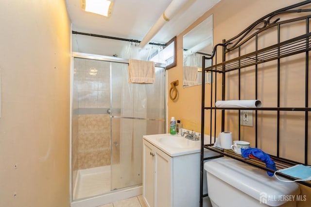 571 Greenbrook Rd, North Plainfield, NJ 07063 - full bathroom with a stall shower, vanity, and tile patterned floors