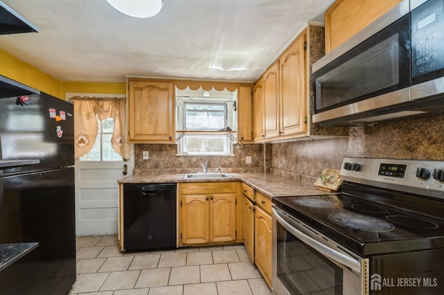 571 Greenbrook Rd, North Plainfield, NJ 07063 - kitchen featuring black appliances, backsplash, and light tile patterned floors