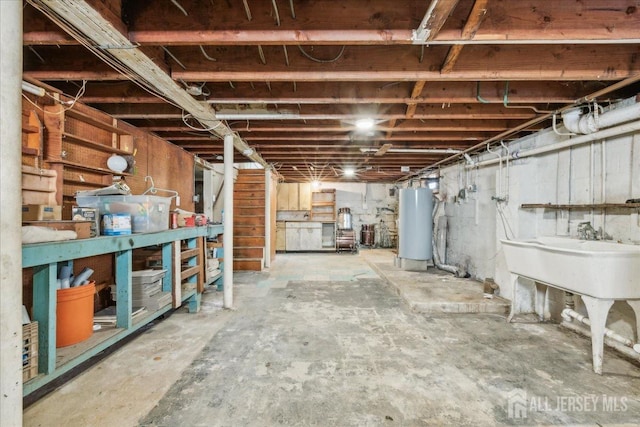399 Highland St, South Amboy, NJ 08879 - unfinished below grade area featuring gas water heater