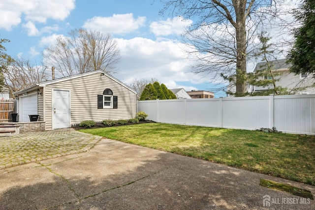 view of yard featuring a garage