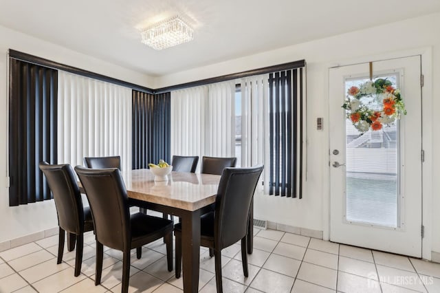 dining room featuring light tile patterned floors