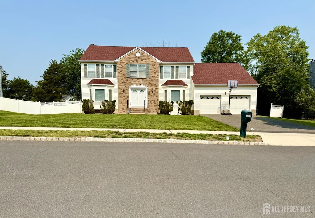 5 Angela Ct, Piscataway, NJ 08854 - view of front of property with asphalt driveway and an attached garage