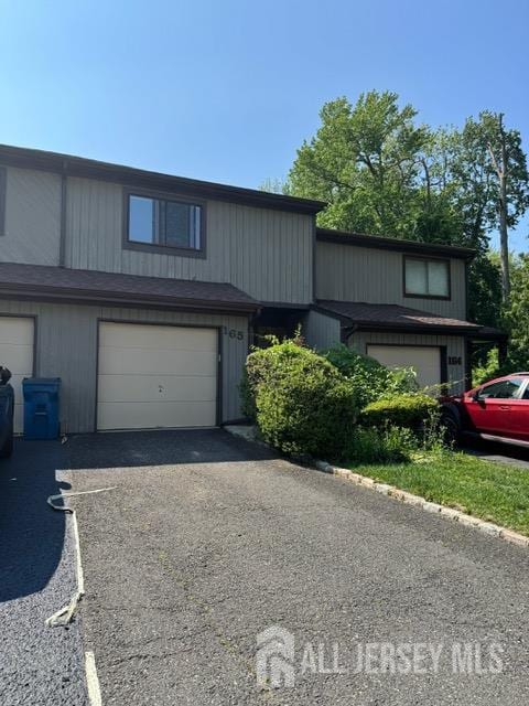 165 Penn Ct, Old Bridge, NJ 07747 - view of front of home with a garage