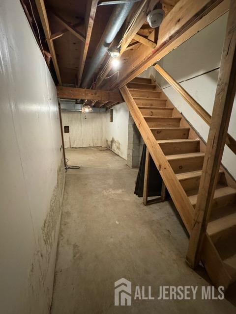 165 Penn Ct, Old Bridge, NJ 07747 - unfinished basement featuring stairway