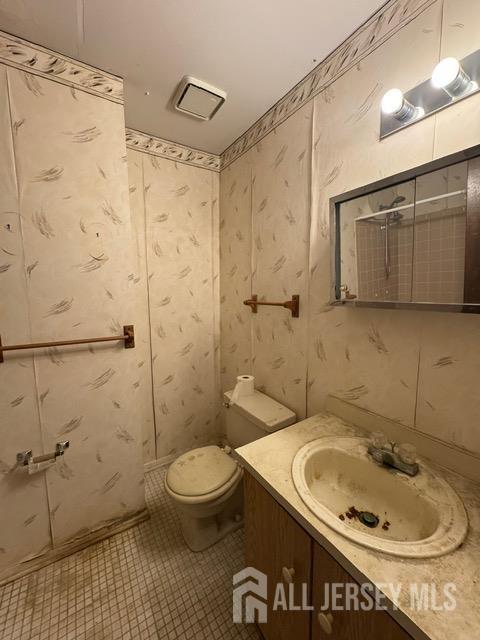165 Penn Ct, Old Bridge, NJ 07747 - bathroom featuring vanity, toilet, and tile patterned floors