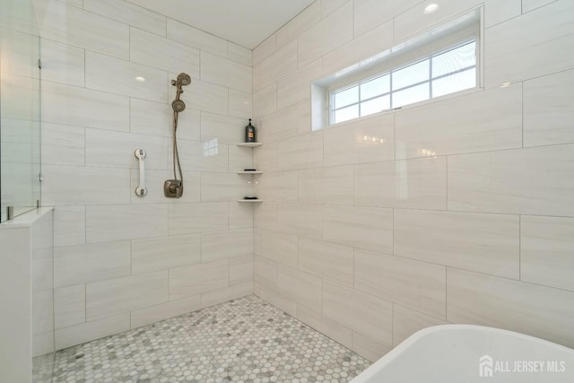 bathroom with separate shower and tub