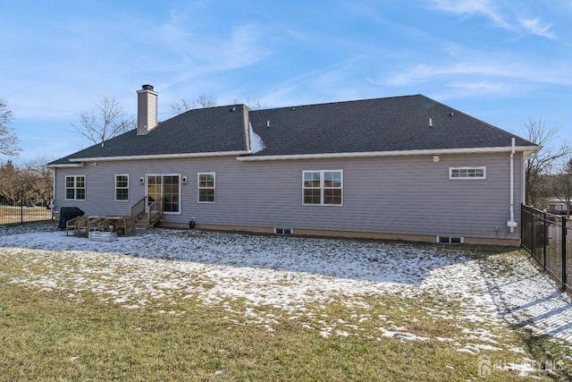 view of snow covered house