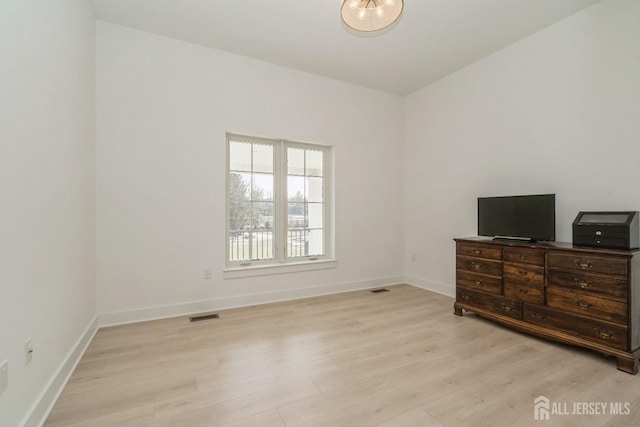 bedroom featuring light wood-type flooring