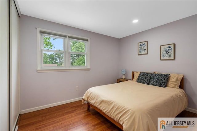119 Brown Ave, Iselin, NJ 08830 - bedroom featuring wood finished floors and recessed lighting