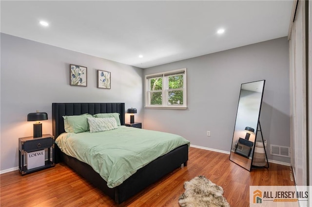 119 Brown Ave, Iselin, NJ 08830 - bedroom with wood finished floors and recessed lighting