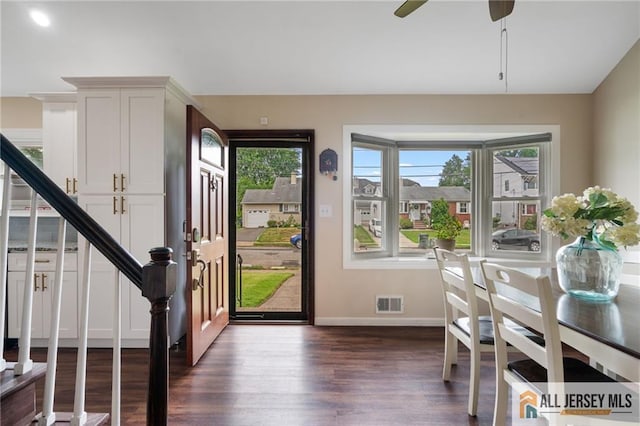 119 Brown Ave, Iselin, NJ 08830 - entryway featuring dark wood-style floors, stairs, and ceiling fan