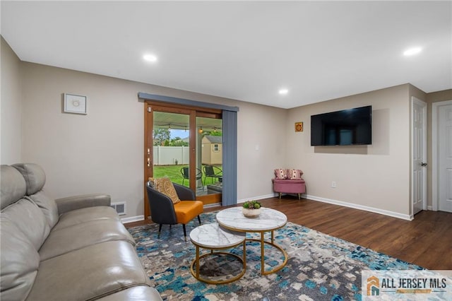 119 Brown Ave, Iselin, NJ 08830 - living area featuring wood finished floors and recessed lighting