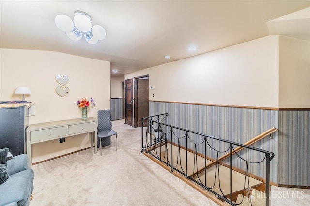 56 Frederick St, Carteret, NJ 07008 - hallway featuring an upstairs landing, a wainscoted wall, and carpet