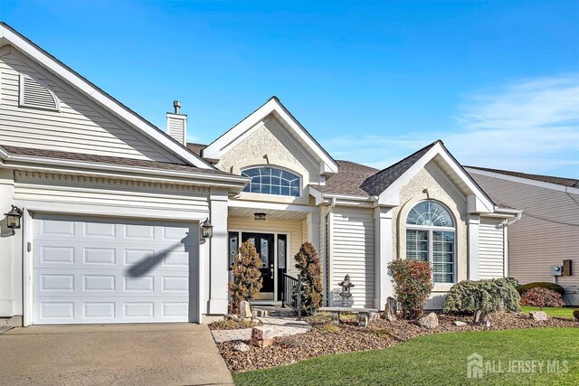 view of front of home featuring a garage