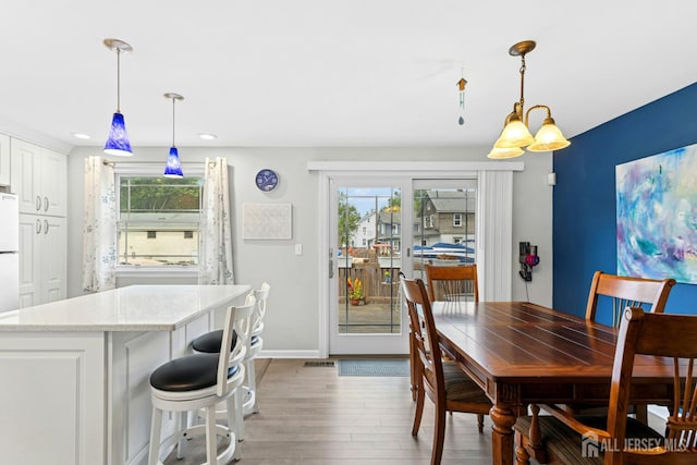 675 Bound Brook Rd Unit C0019, Dunellen, NJ 08812 - dining space with light wood-style flooring and recessed lighting