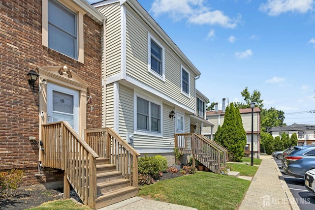 675 Bound Brook Rd Unit C0019, Dunellen, NJ 08812 - view of front of house featuring a front yard